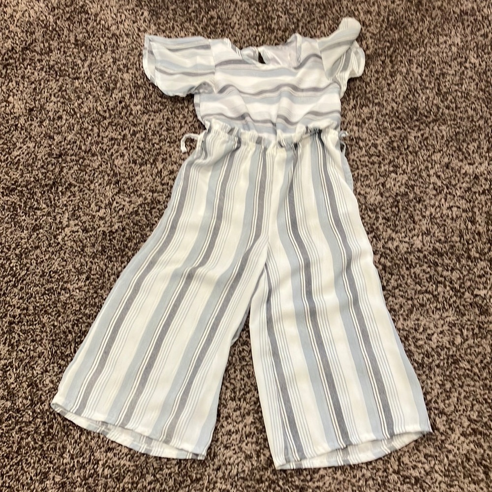 This is a jumper that has thick and thin stripes.